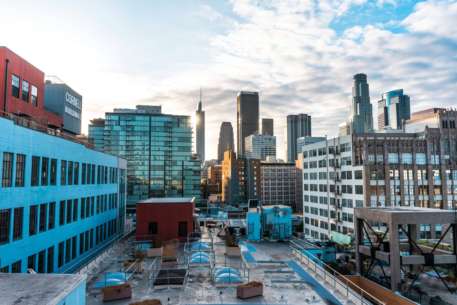 city buildings under white cloudy sky during daytime